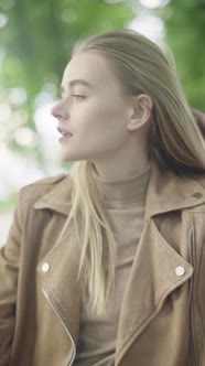 Vertical Video of a Young Skinny Girl in the Park