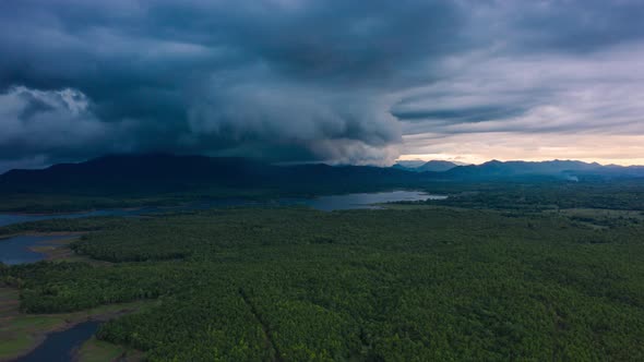 Rain storms and black clouds moving over the mountains.