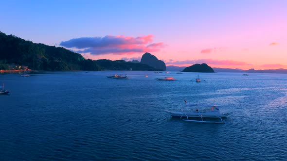 Sail Boats at Sunset on the Sea Lagoon on Corong Beach in El Nido, Palawan, Philippines