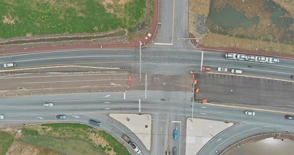 Major asphalt road intersection with multiple highways lanes,