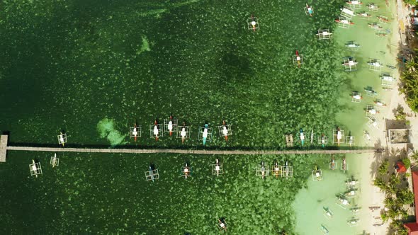 Pier with Boats in the Sea Aerial View