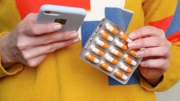 The Girl Makes an Order in an Online Store, Pharmacy, Using an Application on a Smartphone, Scanning