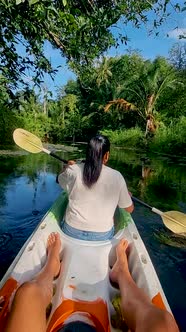 Couple in Kayak in the Jungle of Krabi Thailand Men and Woman in Kayak at a Tropical Jungle in Krabi