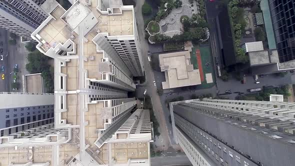 Decaying Housing Alongside a Growing Number of Modern High-rise Buildings.