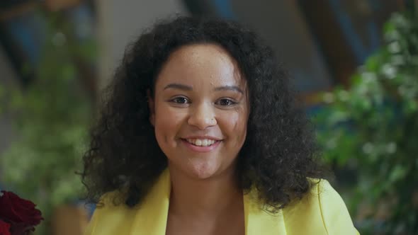 Front Closeup Portrait of Young Mixed Race Beauty African American Black Woman with Short Hair Afro