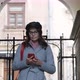 Young Beautiful Girl In Autumn Dress Uses A Smartphone. - VideoHive Item for Sale
