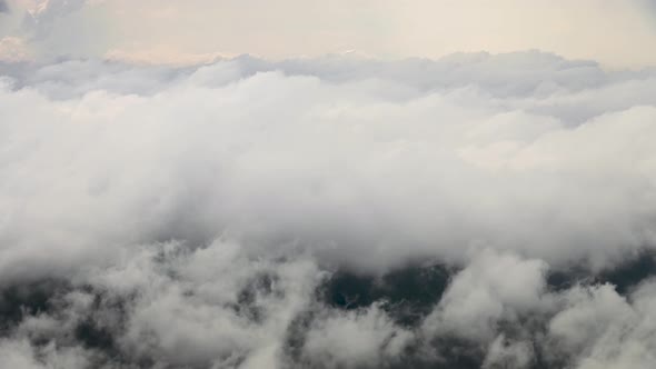 Flying Through Fast Moving Cumulus Clouds