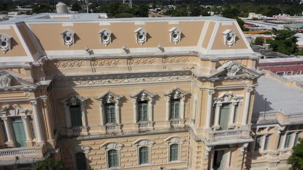 Closeup aerial pull back from Palacio Canton museum mansion on the Paseo de Montejo in Merida, Yucat