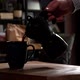Cinematic Slow Motion Pouring Coffee in Navy Blue Mug from Black Mokapot - VideoHive Item for Sale