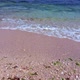 Sunny Beach with Blue Sea Water, Blue Sky and Rocks on the Horizon in a Summer Day. Middle Shot - VideoHive Item for Sale