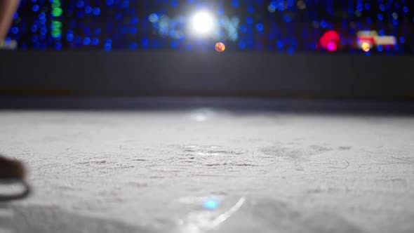 Dancing on Ice Professional Gymnast Performs a Trick on Ice Female Spinning on Skates a View of the