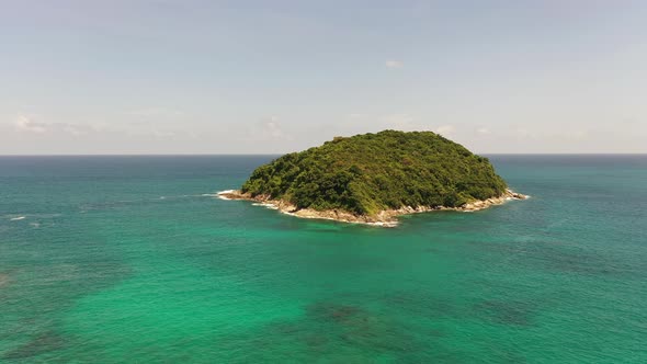 Aerial View Man Island In Turquoise Sea