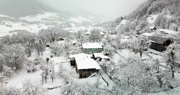 Aerial snowy village and beautiful landscape