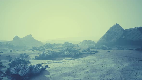 Foggy Mountain Landscape with Snow Cornice Over Abyss Inside Cloud