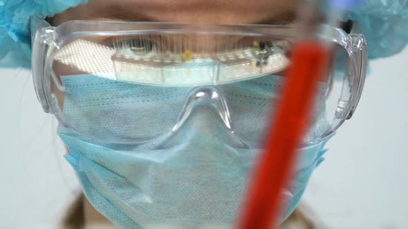 Lab Worker Marking Test Tube With Red Liquid, Flavor Intensifiers Ingredients