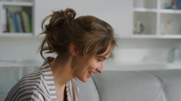 Woman Waving Having Video Call at Home Closeup