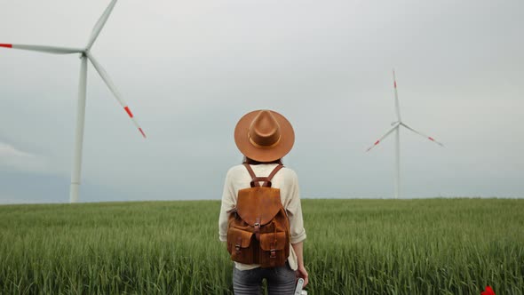 Young girl with a retro camera with alternative energy generation