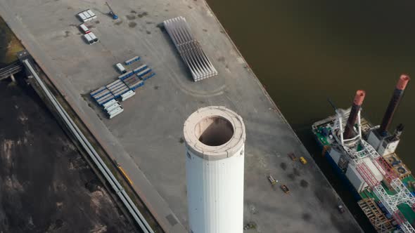 Aerial Flight Orbiting Around the Chimney of Esbjerg Power Station in Denmark