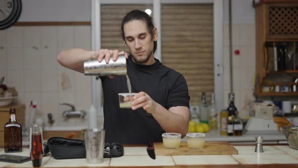 Proud Bartender Shows Final Result of Cocktail in a Video Tutorial for His Channel