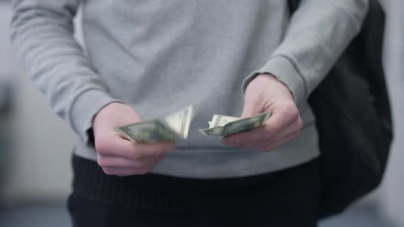 Closeup Male Young Hands Counting Dollars Indoors