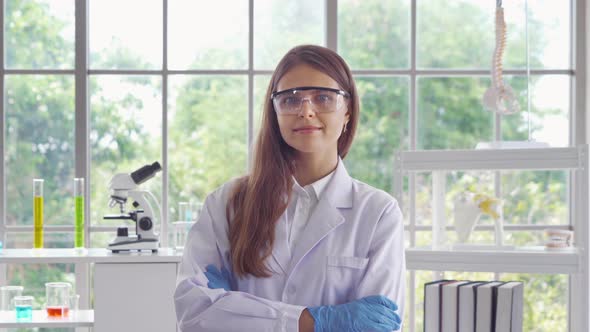 A portrait of western scientist woman with test tube to analysis and develop vaccine