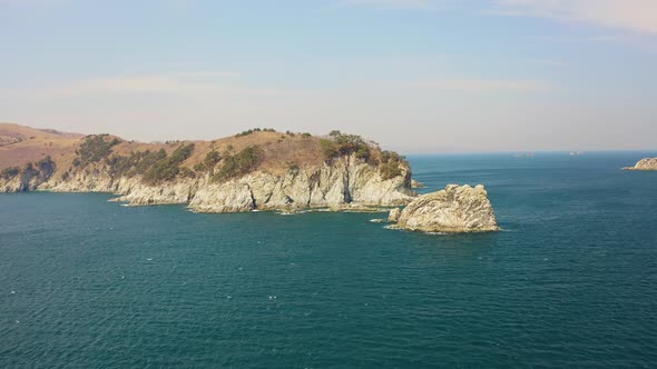 Kekura and Rocky Cape Telyakovsky Washed By the Sea of Japan on a Sunny Day