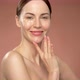 Smiling Woman with Makeup Touching Face - VideoHive Item for Sale