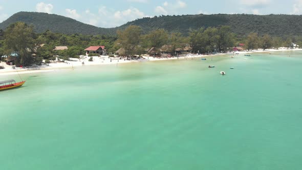 Shallow cristal clear blue water of Saracen Bay beach in Koh Rong Sanloem, Cambodia