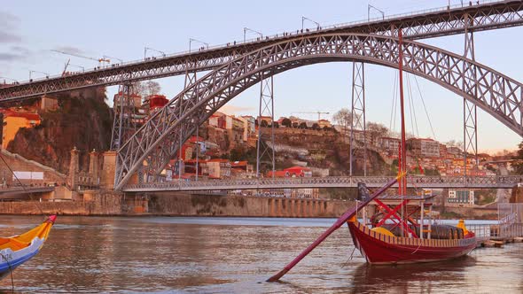 Old Town Cityscape and Bridge Luis First on the Douro River with Traditional Rabelo Boats, Porto.