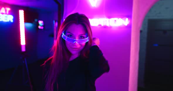 Portrait of a Young Woman in Neon Light
