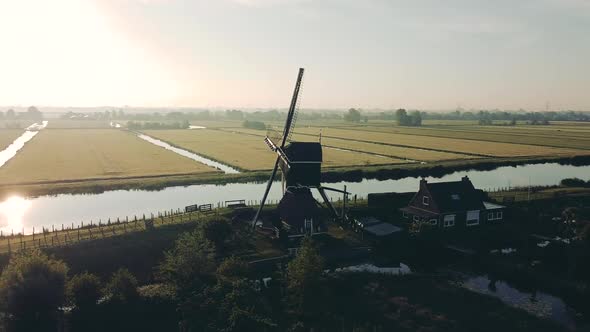 Aerial View of a Traditional Windmill at Sunset in The Netherlands