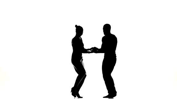 Two Latino Dancers Finishing Dancing, Silhouette, on White