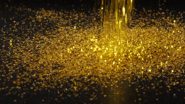 Shiny Gold Particles Falling