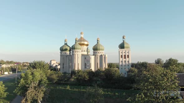 White Orthodox Church on Blue Sky Background