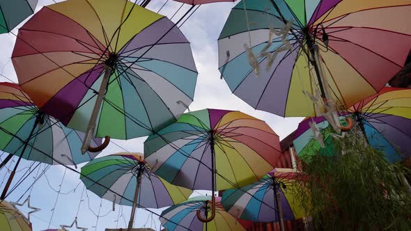 Slow move toward the colorful umbrella