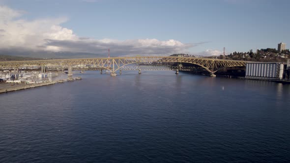 Drone flying towards Ironworkers Memorial Bridge, Vancouver in British Columbia, Canada. Aerial forw