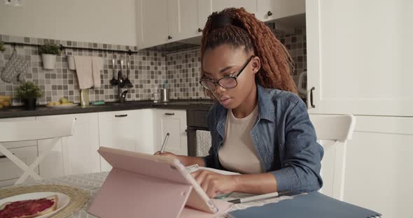 Young Black Student Studying Online