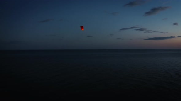 Chinese Lantern Flying In The Sky at Sunset Light