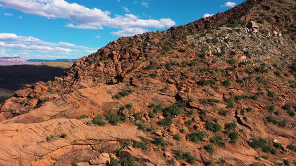 Red-Rock Mountains Near Sedona's Desert Town In Arizona, USA. Aerial Tilt-Down