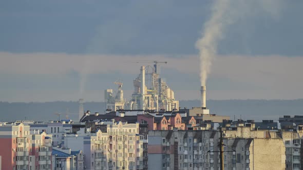 Timelapse of Cement Plant with High Factory Structure and Tower Cranes at Industrial Production Area