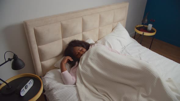 Rested Woman Waking Up Stretching Arms Bed