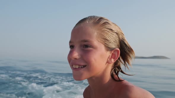 Happy Kid Riding Boat