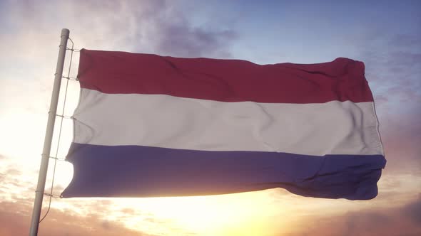 Netherlands Flag Waving in the Wind Sky and Sun Background