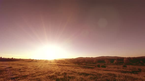  UHD Mountain Meadow Timelapse at the Summer. Clouds, Trees, Green Grass and Sun Rays Movement.