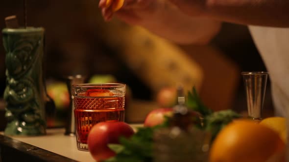 Barman Finishing Making Cocktail