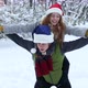 Couple Piggyback Riding in the Snowy Winter - VideoHive Item for Sale