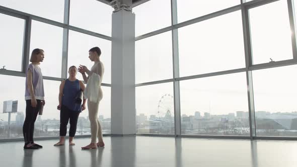 Three Women Chatting In Gym