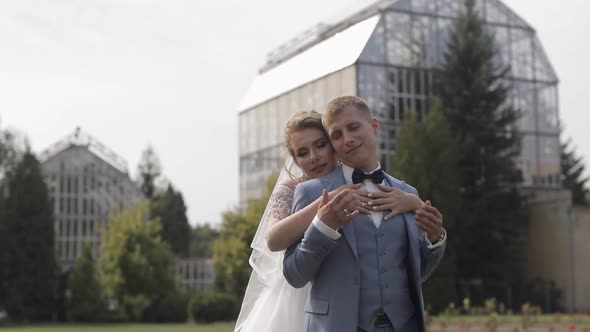 Newlyweds, Caucasian Groom with Bride in the Park, Wedding Couple, Happy Family