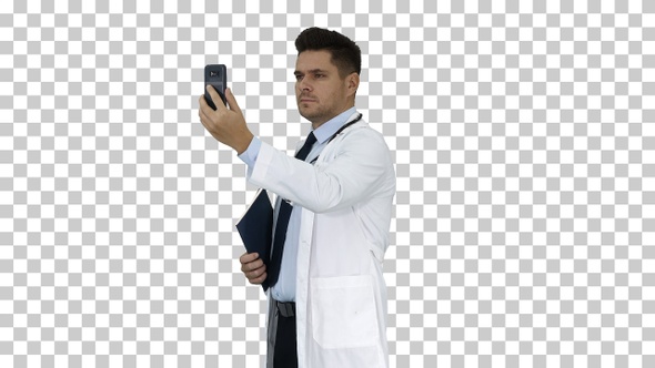 Male doctor making a video call talking, Alpha Channel