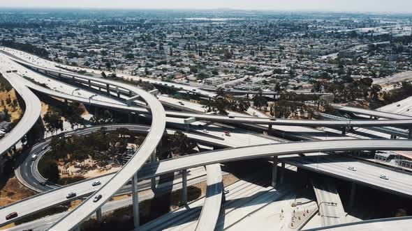 Drone Flying Left High Above Big Judge Pregerson Freeway Junction in Los Angeles with Multiple